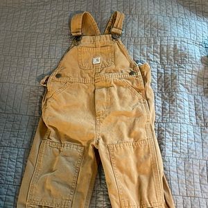 Carhartt overalls.